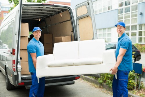 Professional movers assisting with a residential move in Palmers Green