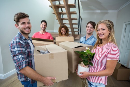 Professional movers assisting with a household move in Chalk Farm