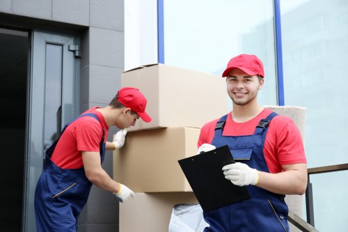 Professional movers assisting with a household move in Addiscombe