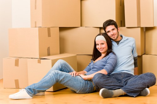 Experienced movers loading furniture onto a truck