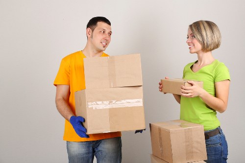 Movers handling office equipment in Poplar